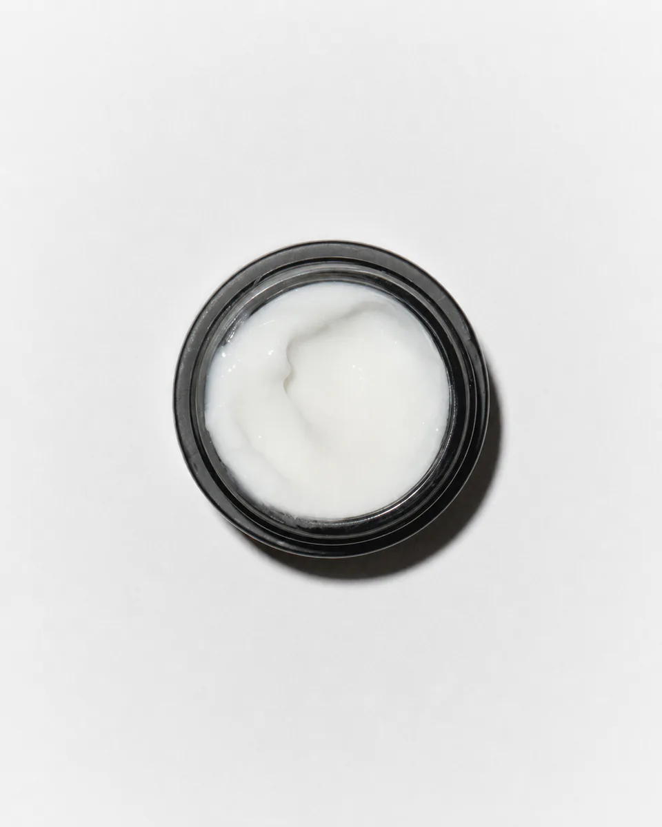 RAWDOG peptide eye cream texture in an open jar