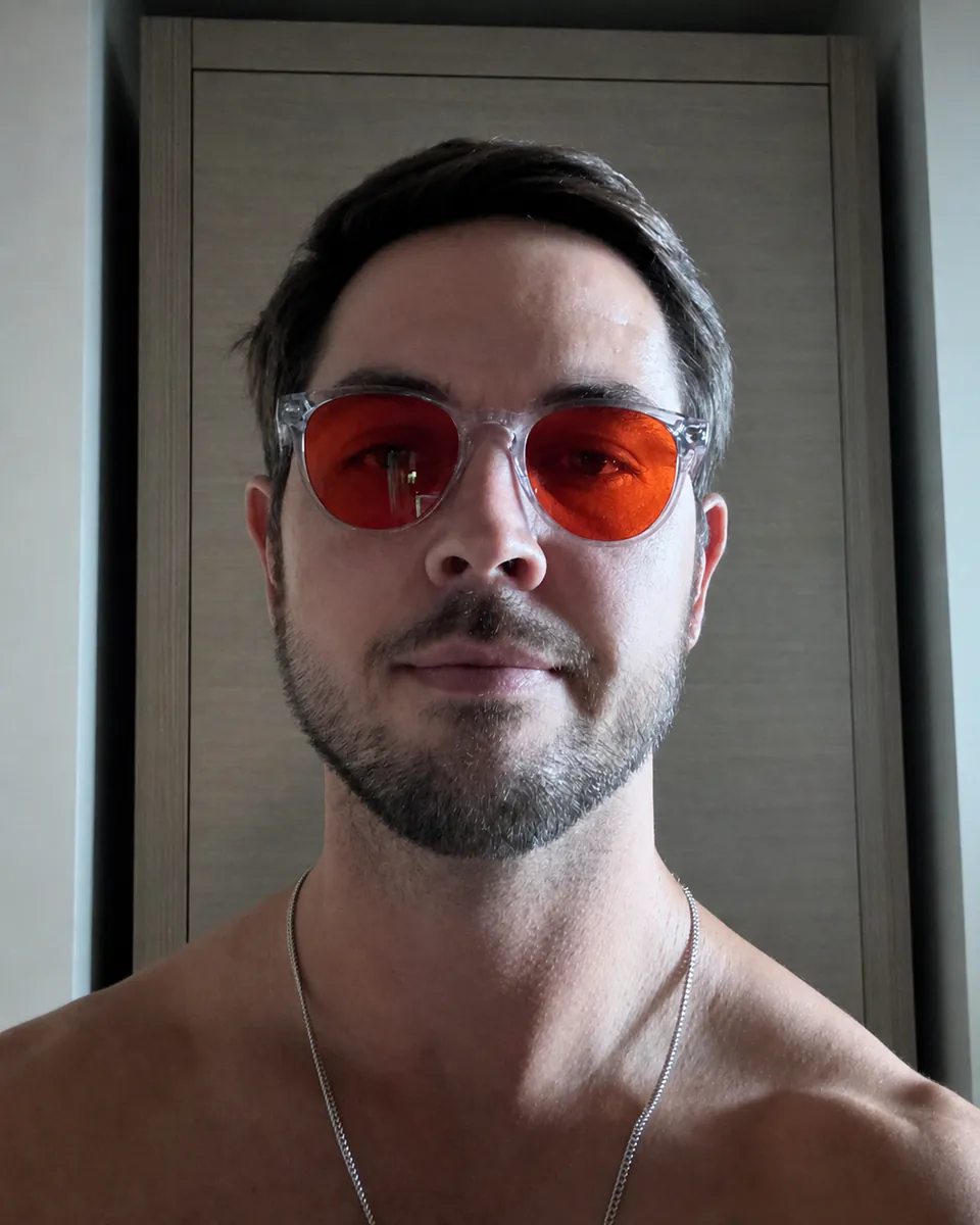 Jackson wearing red BioSpectral glasses as part of his performance stack