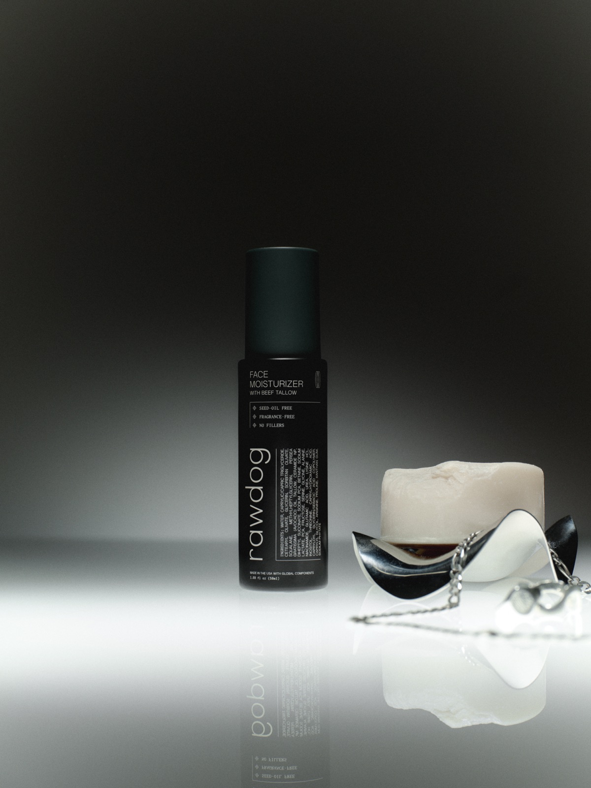 RAWDOG Face Moisturizer displayed on a bathroom countertop