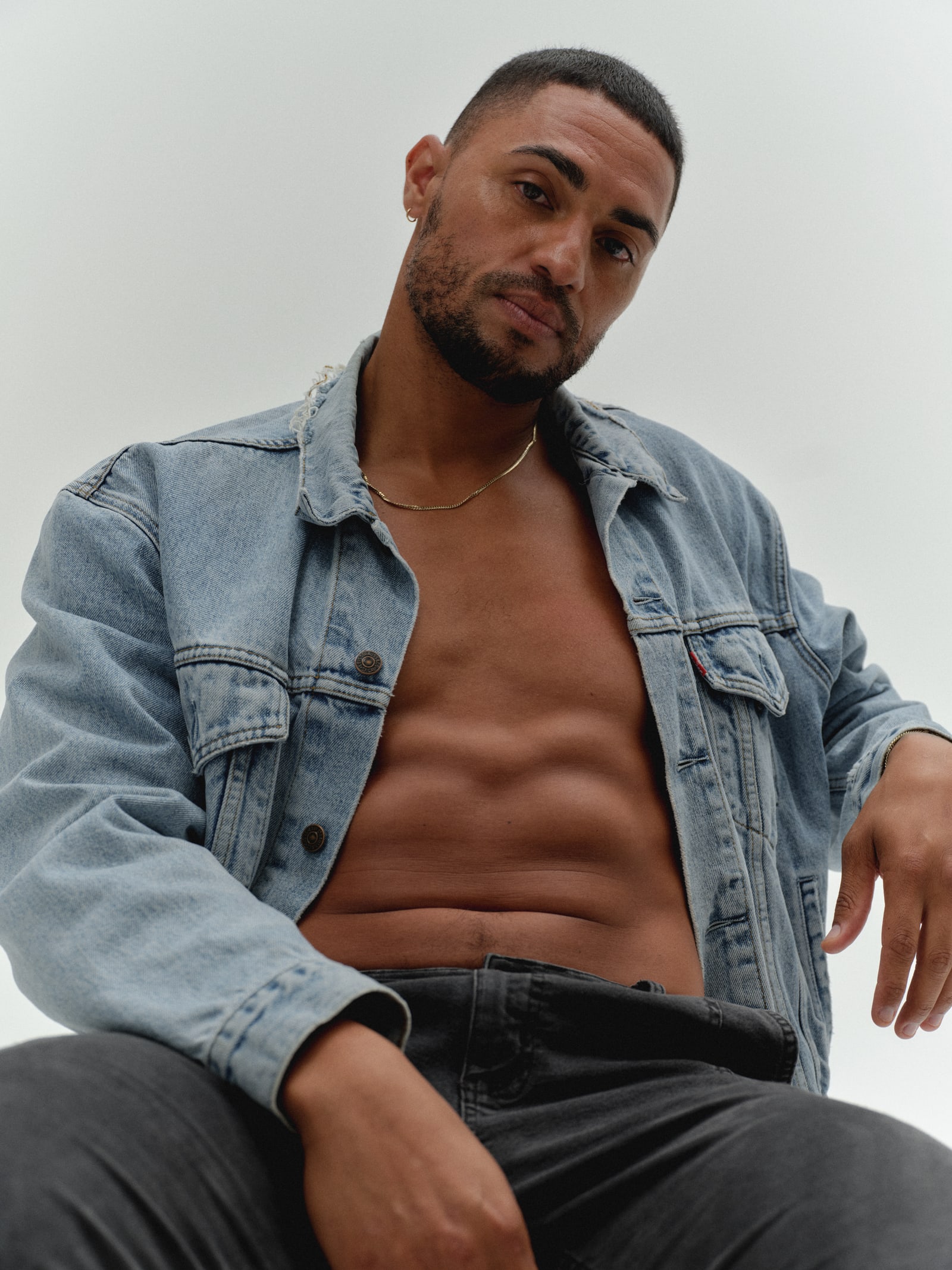 Man in denim jacket representing RAWDOG's health-conscious skincare philosophy